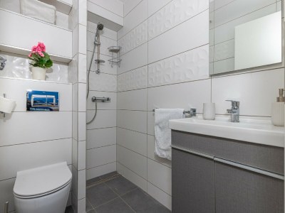 Apartment Apartment in Dramalj near Beach & Pool - Features photo 14