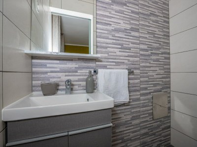 Apartment Apartment in Dramalj near Beach & Pool - Features photo 18