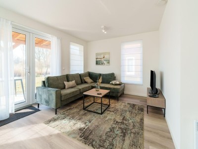 Holiday house Nice holiday home with sauna near a lake - Features photo 9