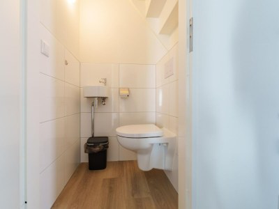 Holiday house Nice holiday home with sauna near a lake - Features photo 12