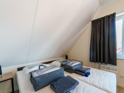 Holiday house Nice holiday home with sauna near a lake - Features photo 16