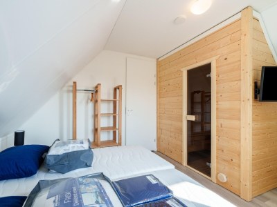 Holiday house Nice holiday home with sauna near a lake - Features photo 22