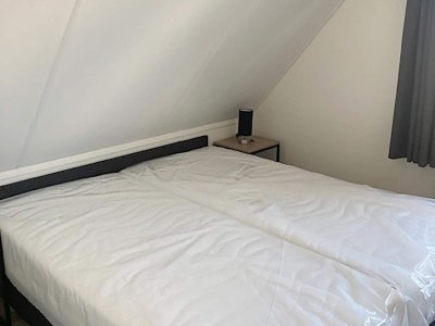 Holiday house Nice holiday home with sauna near a lake - Features photo 26