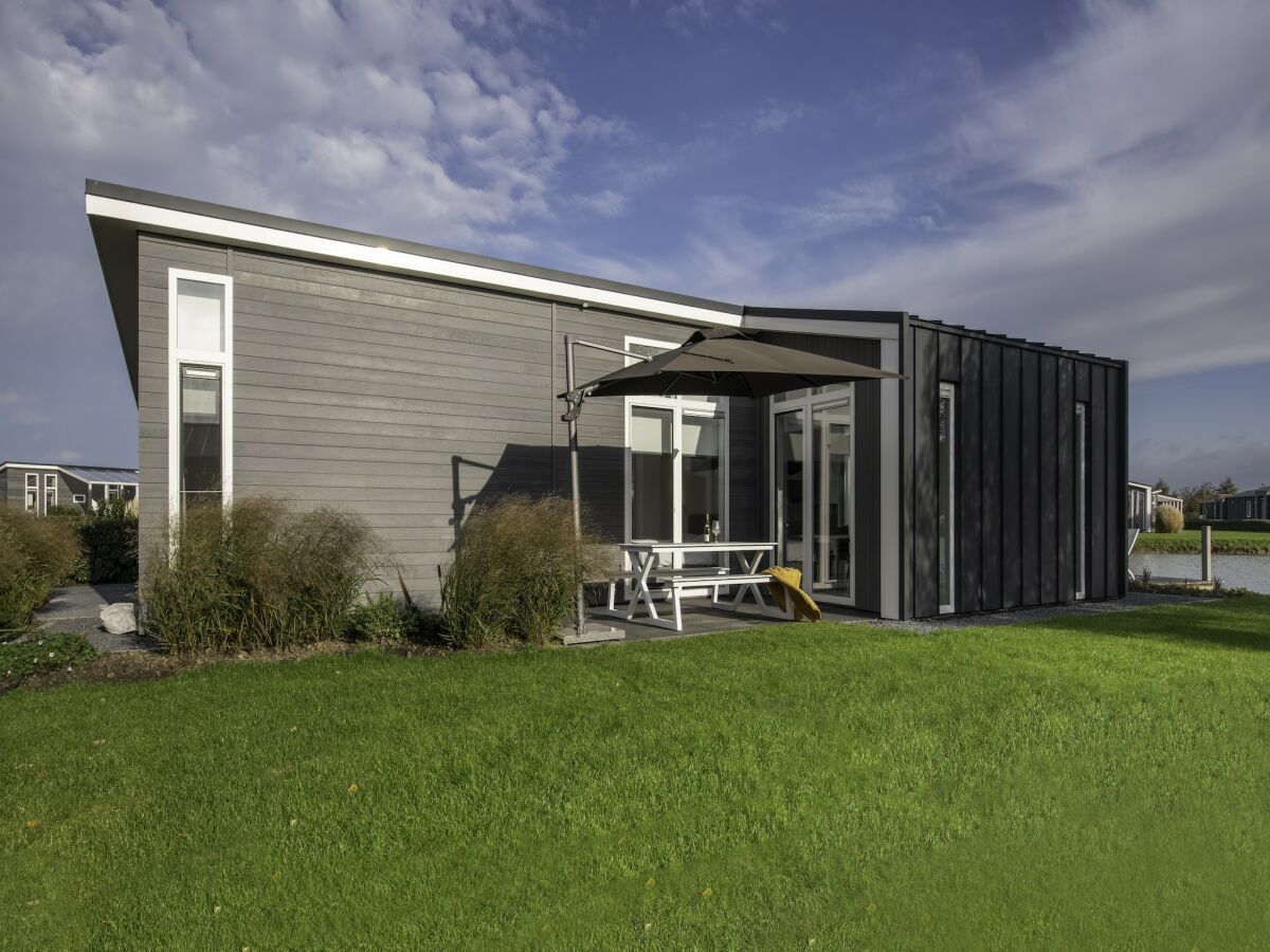 Holiday park Chalet in Zeeland with Sauna by the Water - Outdoor photo 5