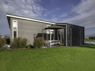 Holiday park Chalet in Zeeland with Sauna by the Water - Outdoor photo 5