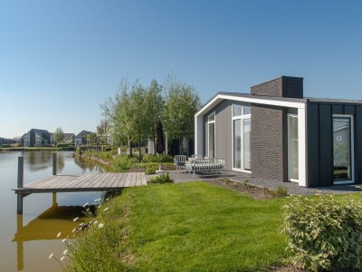 Holiday park Chalet in Zeeland with Sauna by the Water - Outdoor photo 7