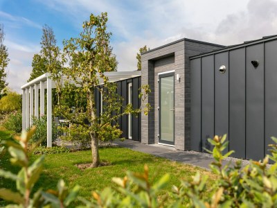 Holiday park Holiday Home in Zeeland with Streamside Terrace - Outdoor photo 3