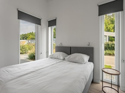 Holiday park Holiday Home in Zeeland with Streamside Terrace - Features photo 18