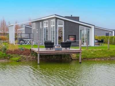Holiday park Detached House on Lake in Zeeland Holiday Park in Wemeldinge - Holiday park
