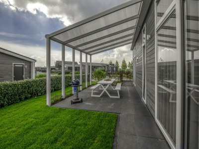 Holiday park Detached House on Lake in Zeeland Holiday Park - Outdoor photo 2