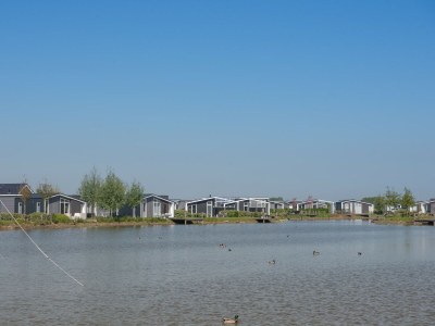 Holiday park Detached House on Lake in Zeeland Holiday Park - Outdoor photo 39