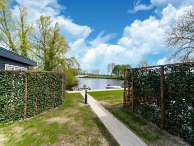 Holiday house Schönes Ferienhaus in Bantega mit Boot an Steg - Outdoor photo 7