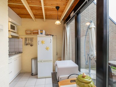 Holiday house Holiday Home in De Punt with Pool & Garden - Features photo 12