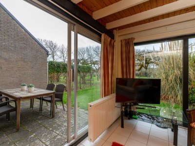 Holiday house Holiday Home in De Punt with Pool & Garden - Features photo 23