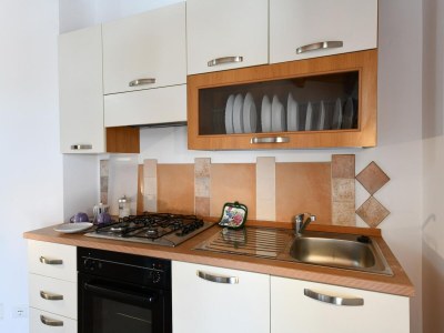 Apartment Schöne Wohnung mit Pool - Features photo 27