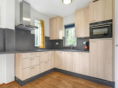 Holiday park Spacious Home with Garden - Features photo 6