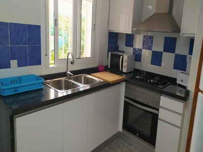 Apartment Apartment near Beach with Serene Garden - Features photo 10