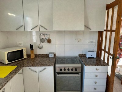 Apartment Apartment near Beach with Serene Garden - Features photo 11