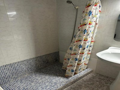 Apartment Apartment near Beach with Serene Garden - Features photo 16