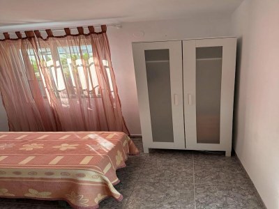 Apartment Apartment near Beach with Serene Garden - Features photo 17