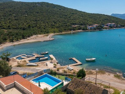 Apartment Beachfront Apartment house Hon with pool - Environment photo 53