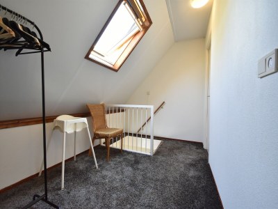 Holiday house Cosy holiday home with large garden - Features photo 10