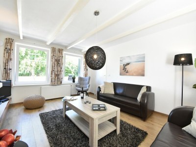 Holiday house Cosy holiday home with large garden - Features photo 11