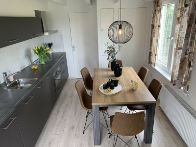 Holiday house Cosy holiday home with large garden - Features photo 20