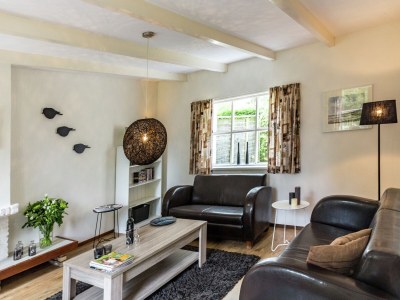 Holiday house Cosy holiday home with large garden - Features photo 23