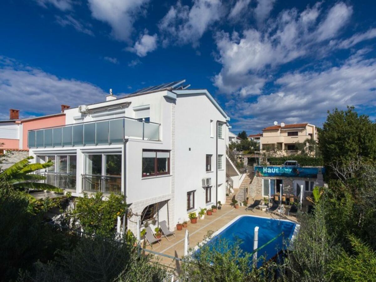 Holiday house Appartement Koralj °1 mit beheiztem Pool