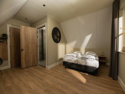 Holiday park Group House in Twente with Hot Tub - Features photo 24