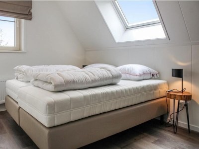 Holiday park Villa mit Garten in einem Ferienpark am Wasser - Features photo 5