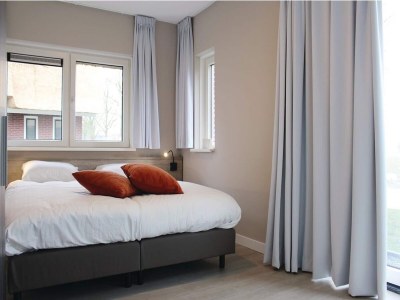 Holiday park Villa in Idskenhuizen mit Steg für 10 Von Belvilla - Features photo 16