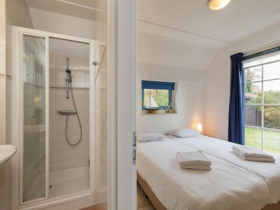 Holiday park Holiday Home on Texel with Spacious Garden - Features photo 12