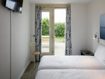 Holiday park Villa in Zeeland mit Sauna und Strandzugang - Features photo 12