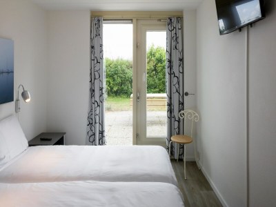 Holiday park Villa in Zeeland mit Sauna und Strandzugang - Features photo 14