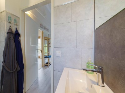 Holiday park Ferienhaus am Meer mit Sauna - Features photo 19