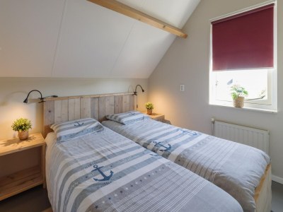 Holiday park Holiday Home in Zeeland with Spacious Garden - Features photo 11