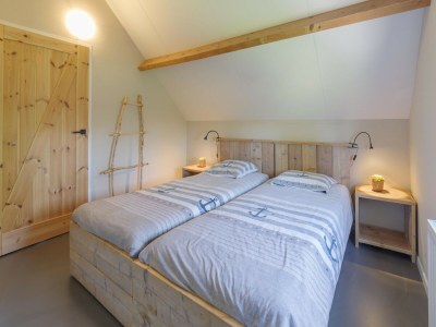 Holiday park Holiday Home in Zeeland with Spacious Garden - Features photo 14