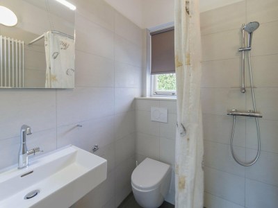 Holiday park Holiday Home in Zeeland with Spacious Garden - Features photo 15