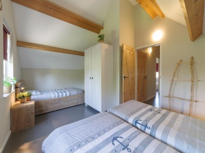 Holiday park Holiday Home in Zeeland with Spacious Garden - Features photo 17