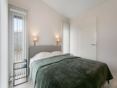 Holiday park Chalet in Wemeldinge am Teich für 4 Von Belvilla - Features photo 9