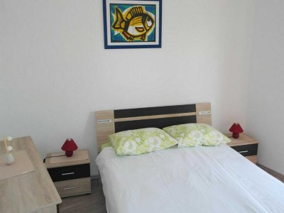 Apartment Apartment Račić - Two-bedroom Apartment with Balcony and Sea View - Features photo 11