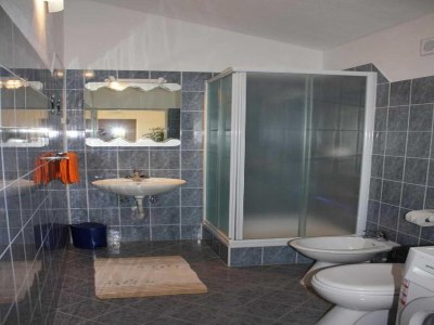 Apartment Apartment Račić - Two-bedroom Apartment with Balcony and Sea View - Features photo 12