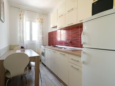Apartment Holiday Home in Rogoznica near Beach - Features photo 16