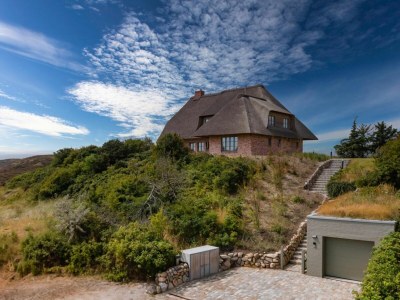 Holiday house Ferienhaus The One Sylt - Traumhaus unter Reet, zwischen Wattenmeer und Nordsee - Outdoor photo 4