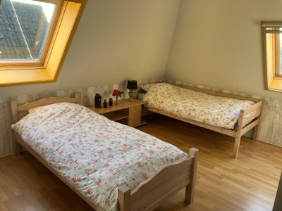 Holiday house Spacious holiday home close to the sea - Features photo 10