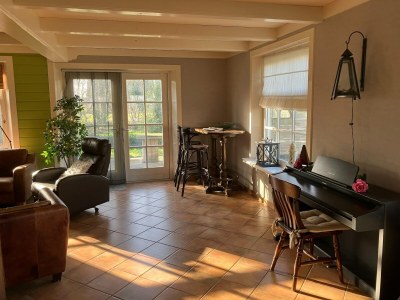 Holiday house Spacious holiday home close to the sea - Features photo 11