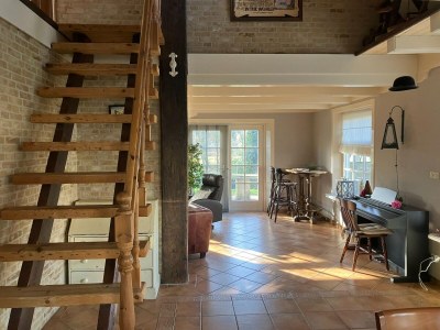 Holiday house Spacious holiday home close to the sea - Features photo 12