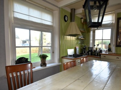 Holiday house Spacious holiday home close to the sea - Features photo 13